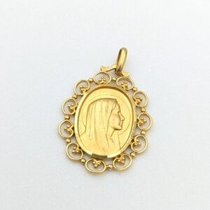 Vintage gold filled religious Virgin Mary open metalwork pendant